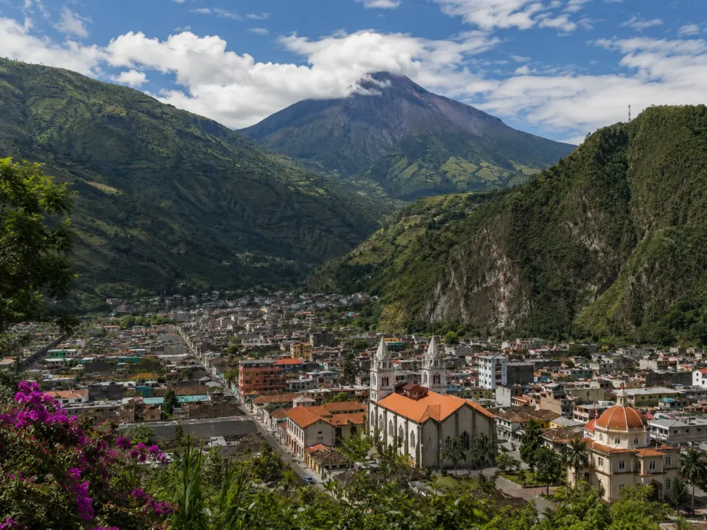 Scenic view of Cotopaxi Volcano over a city landscape.