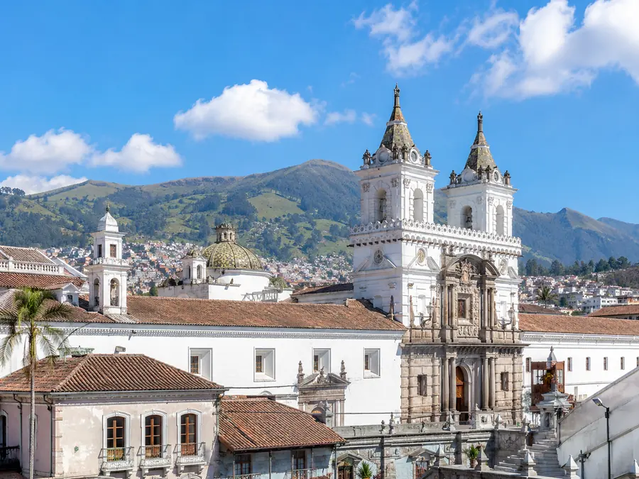 View of the Quito Historic Center with mountains in the background.